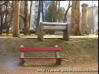 Middle-aged redhead peeing on the streets with people around