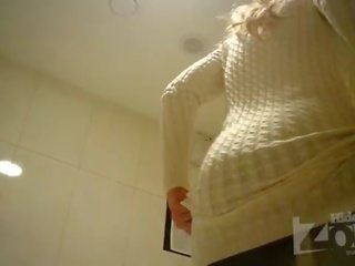 Captivating blonde in toilet shaved pussy and anus closeups.