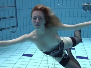 Extraordinary Teen With Black Leather Clothes Underwater