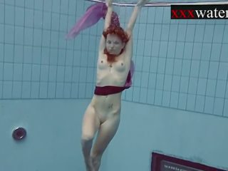 Smoking incredible Russian redhead in the pool
